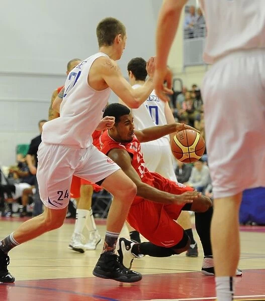 Intense Rivalry: Flyers vs. United at SGS Wise Campus (November 2014) - A Basketball Showdown - Bristol Flyers and Surrey United Go Head-to-Head