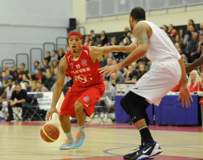Framed Print : Intense Rivalry: Flyers vs. United at SGS Wise Campus - British Basketball League Clash