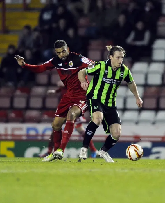 Framed Print : Intense Rivalry: Fontaine vs Mackail-Smith - Football Clash between Bristol City and Brighton & Hove Albion