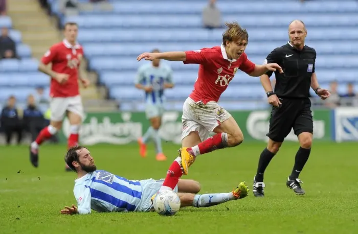 Framed Print : Intense Rivalry: Freeman vs. O'Brien Tackle - Bristol City vs. Coventry City Framed Print : Intense Rivalry: Freeman vs. O'Brien Tackle - Bristol City vs. Coventry City