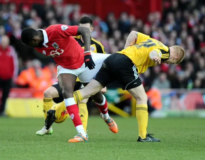 Framed Print : Intense Rivalry: Kennedy Grabs Emmanuel-Thomas Shorts During Bristol City vs Sheffield United Match