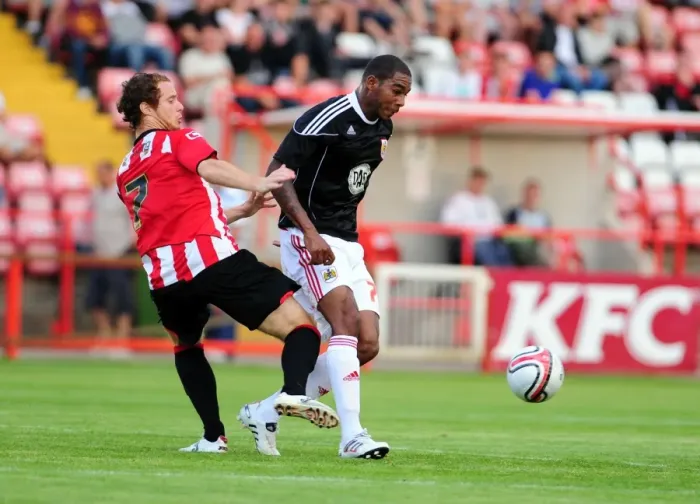 Framed Print : Intense Rivalry: Marvin Elliott vs. Ryan Harley - A Hard-Fought Battle Between Bristol City and Exeter City