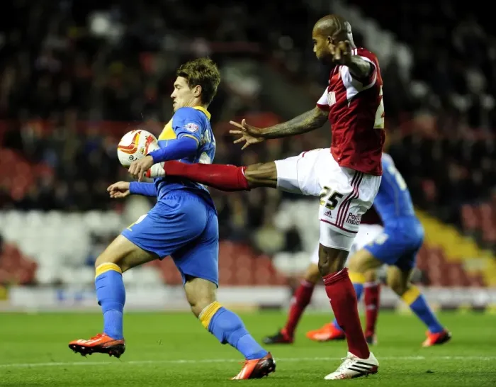 Framed Print : Intense Rivalry: Marvin Elliott vs Tom Bradshaw - Battle for Ball Control at Ashton Gate Framed Print : Intense Rivalry: Marvin Elliott vs Tom Bradshaw - Battle for Ball Control at Ashton Gate