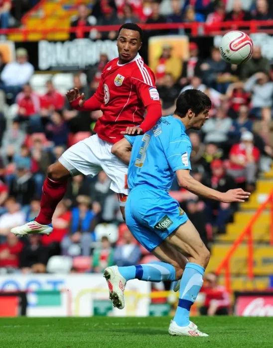 Framed Print : Intense Rivalry: Maynard vs. Friend in the Championship Clash between Bristol City and Doncaster Rovers, April 2011