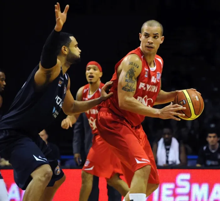 Framed Print : Intense Rivalry: McLaughlin-Williams vs. Unnamed Player in BBL Cup Match between Worcester Wolves and Bristol Flyers