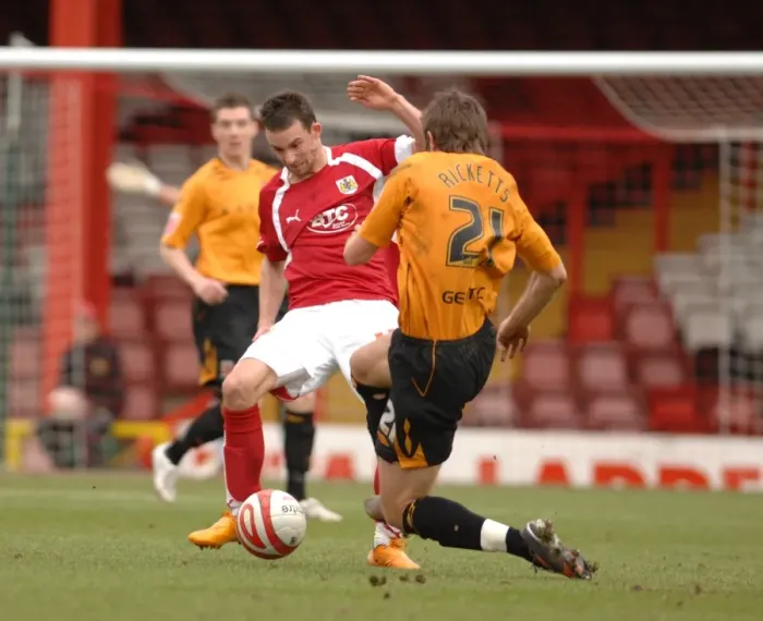 Framed Print : Intense Rivalry: Michael McIndoe in Action - Bristol City vs Hull City Framed Print : Intense Rivalry: Michael McIndoe in Action - Bristol City vs Hull City