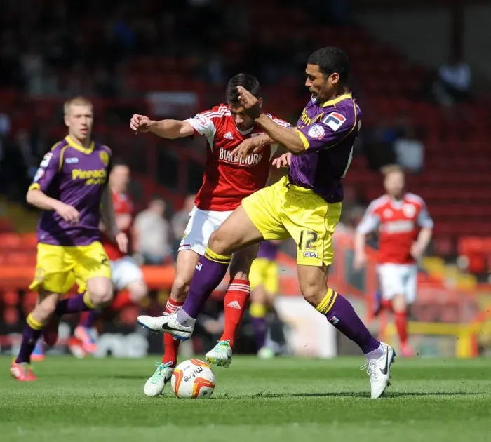 Framed Print : Intense Rivalry: Mullins vs Baldock Clash at Ashton Gate - Football Battle between Notts County's Hayden Mullins and Sam Baldock of Bristol City