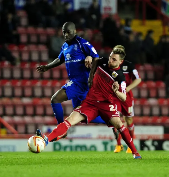 Framed Print : Intense Rivalry: Paul Anderson vs. Morgaro Gomis Clash at Ashton Gate - Bristol City vs. Birmingham City, Npower Championship Framed Print : Intense Rivalry: Paul Anderson vs. Morgaro Gomis Clash at Ashton Gate - Bristol City vs. Birmingham City, Npower Championship