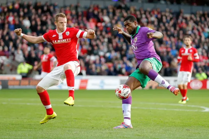Framed Print : Intense Rivalry: Peter Ramage Stands Firm Against Jay Emmanuel-Thomas's Charge (Barnsley vs. Bristol City, Football)