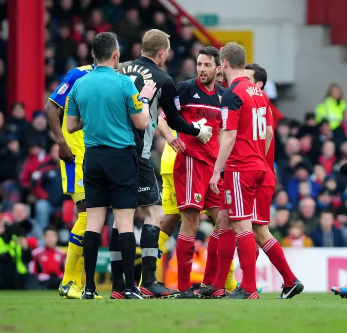 Framed Print : Intense Rivalry: Players Clash in Bristol City vs Sheffield Wednesday Match