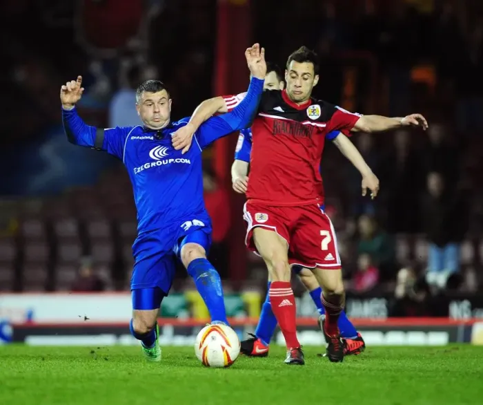 Framed Print : Intense Rivalry: Sam Baldock vs. Paul Robinson Clash in Bristol City vs. Birmingham City Football Match
