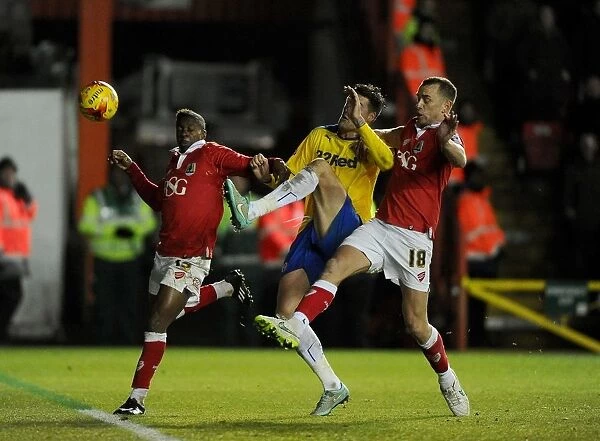 Intense Rivalry: Wilbraham and Agard Fight for Control in Bristol City vs Crawley Town Football Match, December 2014