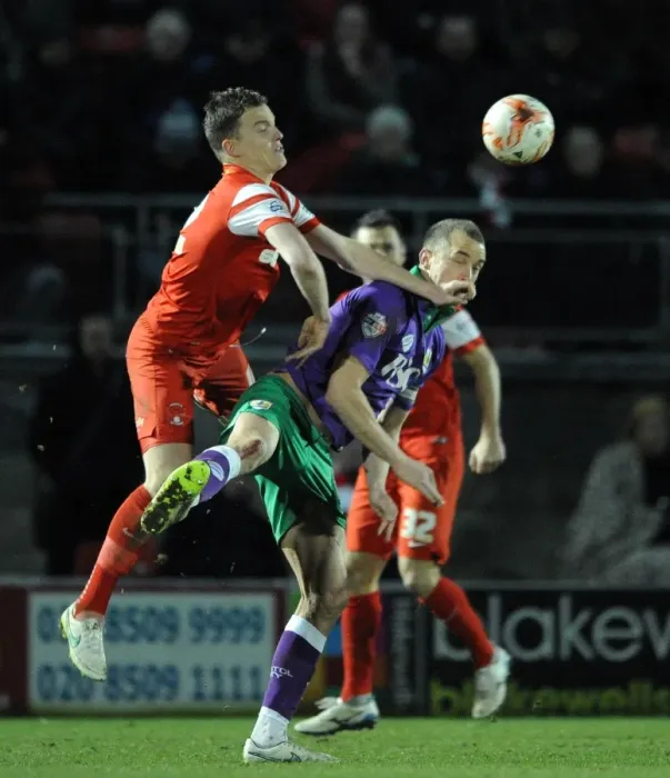 Framed Print : Intense Rivalry: Wilbraham vs. Lowry Clash in Leyton Orient vs. Bristol City Football Match, Sky Bet League One (March 2015)