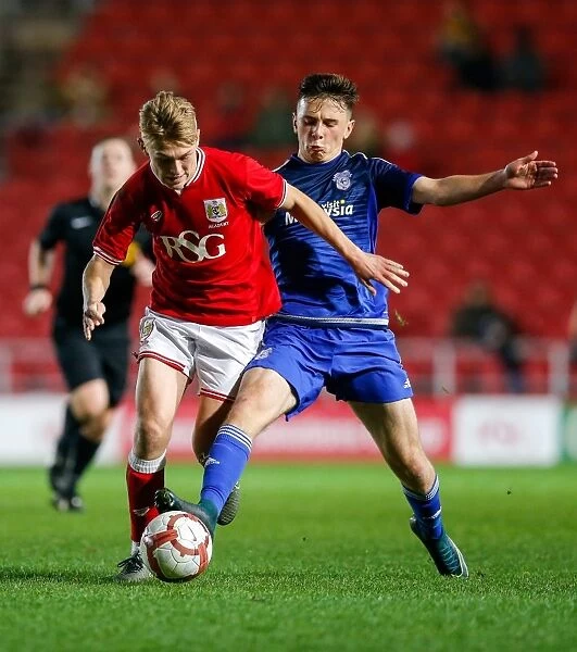 Jake Andrews Fouled by Mark Harris in FA Youth Cup Match: Bristol City U18s vs. Cardiff City U18s