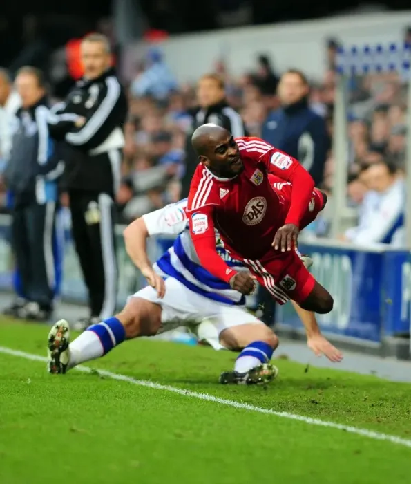 Framed Print : Jamal Campbell-Ryce Fouled by Bradley Orr in QPR vs. Bristol City Championship Match (03 / 01 / 2011)
