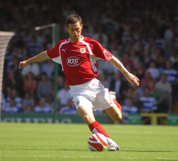 Framed Print : Jamie McAllister Faces Off Against QPR: A Moment from the Bristol City vs. QPR Match