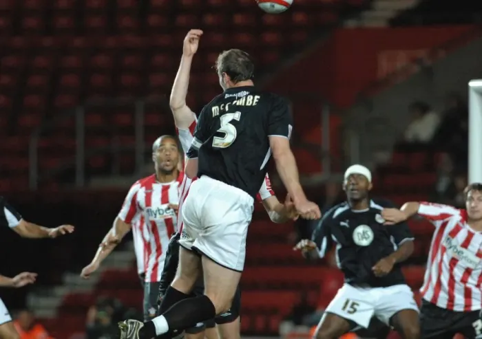 Framed Print : Jamie McCombes header hits the hand of defender alex pearce