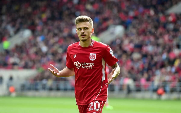 Jamie Paterson Rallies the Crowd: Intense Moment at Ashton Gate during Bristol City vs. Queens Park Rangers