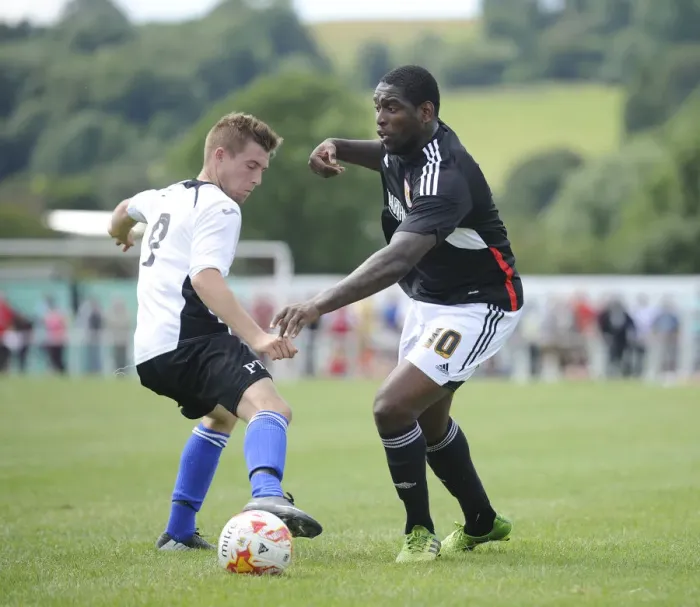Framed Print : Jay Emmanuel-Thomas of Bristol City Passes by Portishead's Danny Benn - Pre-Season Friendly, 2014