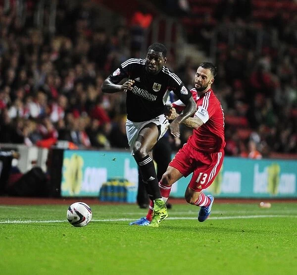 Jay Emmanuel-Thomas of Bristol City Skirts Past Danny Fox of Southampton in Capital One Cup Clash