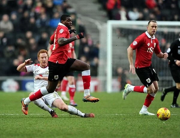 Jay Emmanuel-Thomas Dodges Dean Lewington: Intense Moment from MK Dons vs. Bristol City Football Match, February 2015