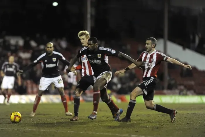 Framed Print : Jay Emmanuel-Thomas Scores Past Brentford Defense in Sky Bet League One Clash