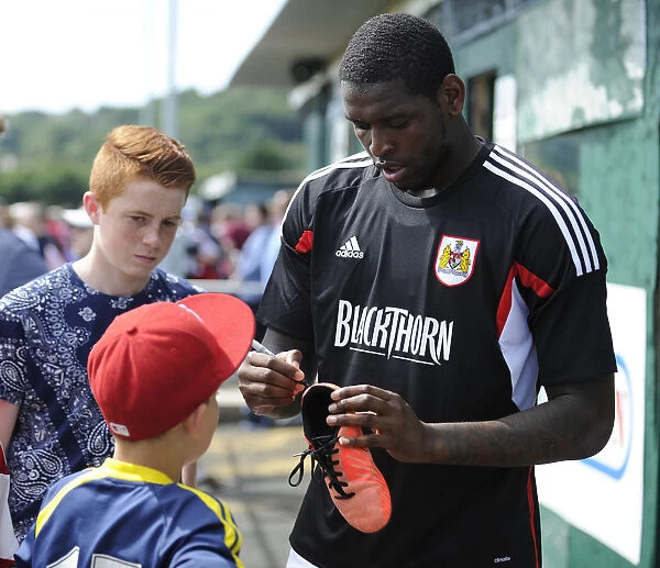 Jay Emmanuel-Thomas Signs Boot at Portishead Town's The Playing Fields During Pre-Season Friendly Against Bristol City