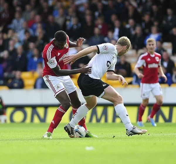 Jay Emmanuel-Thomas Tackled by Liam Chilvers in Port Vale vs. Bristol City Football Match, October 2013
