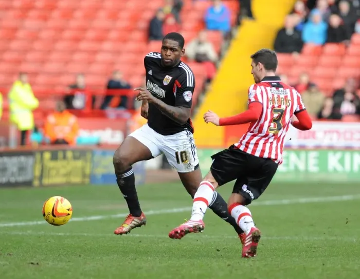 Framed Print : Jay Emmanuel-Thomas vs Bob Howard: Intense Moment in Sheffield United vs Bristol City Football Match, February 2014