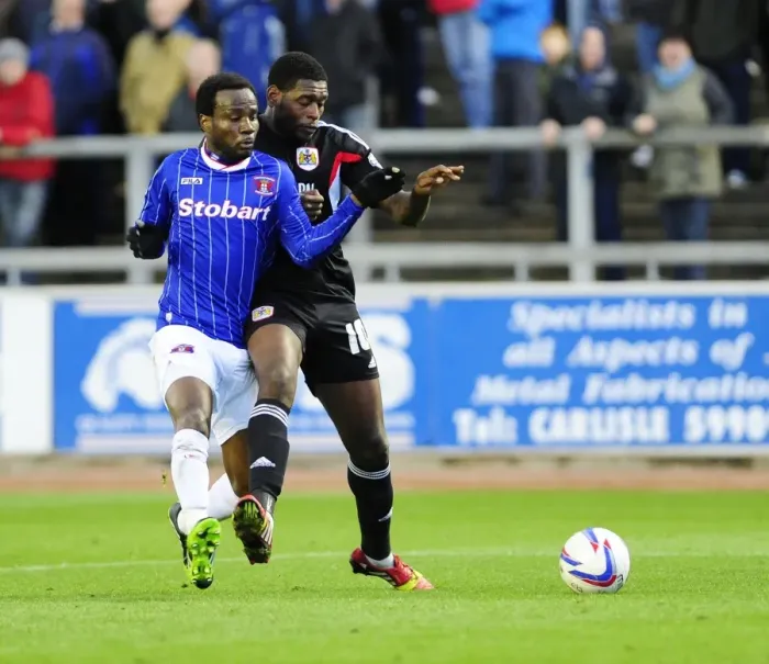 Framed Print : Jay Emmanuel-Thomas vs. David Symington: Intense Moment in Carlisle United vs. Bristol City Football Match, October 2013 Framed Print : Jay Emmanuel-Thomas vs. David Symington: Intense Moment in Carlisle United vs. Bristol City Football Match, October 2013