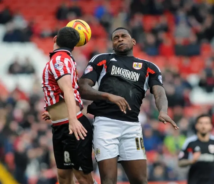 Framed Print : Jay Emmanuel-Thomas vs Michael Doyle: Intense Header Battle at Bramall Lane - Sheffield United vs Bristol City, Sky Bet League One