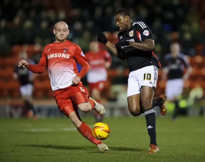 Framed Print : Jay Emmanuel-Thomas vs Scott Cuthbert: Intense Midfield Battle at Leyton Orient vs Bristol City, 2014