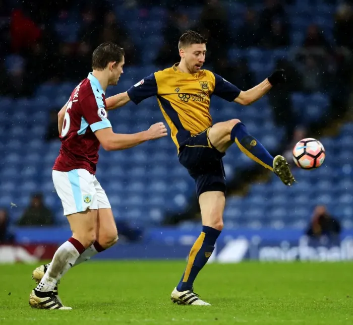 Framed Print : Jens Hegeler vs James Tarkowski Clash at Turf Moor: Burnley vs Bristol City, FA Cup 2017
