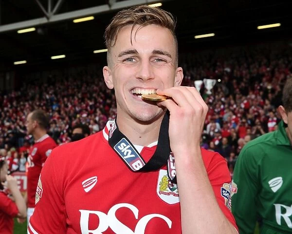 Joe Bryan's Triumph: Biting the Medal after Bristol City's Win over Walsall (May 3, 2015)