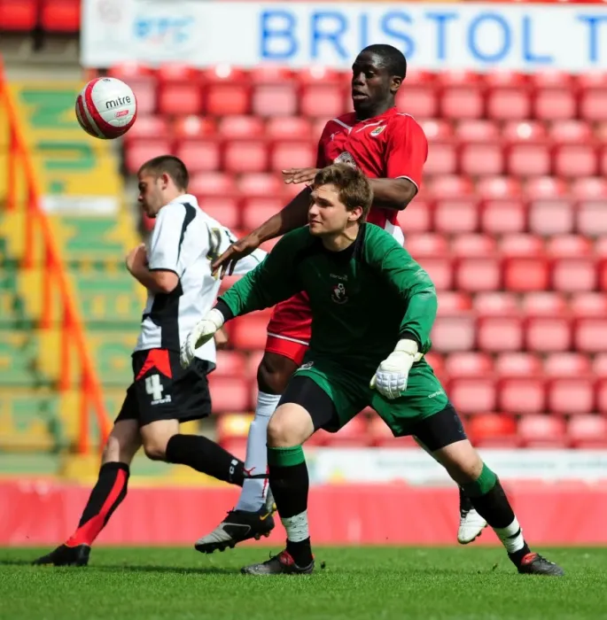 Framed Print : John Akinde in Action for Bristol City Against Bournemouth Reserves