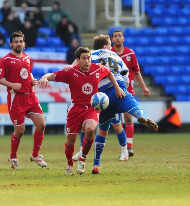 Framed Print : Johnson vs Howard: Intense Battle in the Championship Clash between Reading and Bristol City - 13 / 03 / 2010