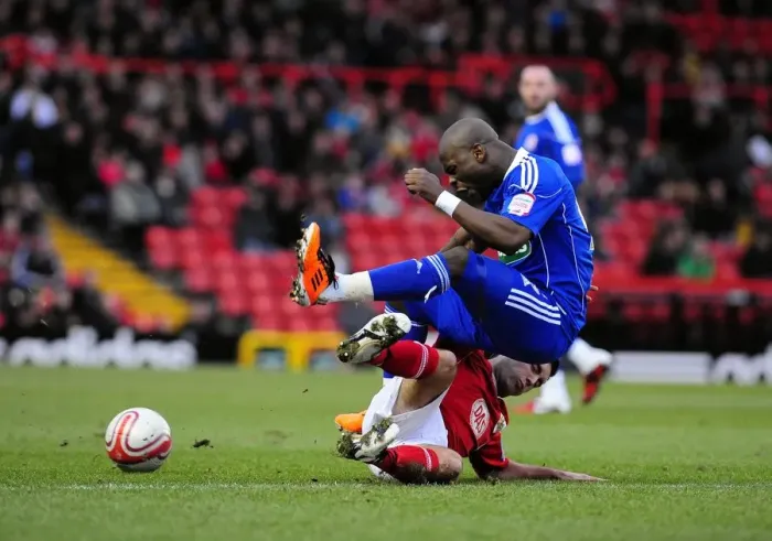 Framed Print : Johnson vs. Lita: Intense Championship Showdown - Bristol City's Lee Johnson Tackles Middlesbrough's Leroy Lita (January 15, 2011) Framed Print : Johnson vs. Lita: Intense Championship Showdown - Bristol City's Lee Johnson Tackles Middlesbrough's Leroy Lita (January 15, 2011)