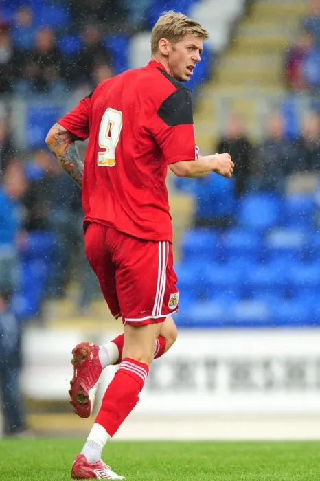 Framed Print : Jon Stead of Bristol City in Action against St Johnstone at McDiarmid Park, Perth (Pre-Season Friendly), August 2012