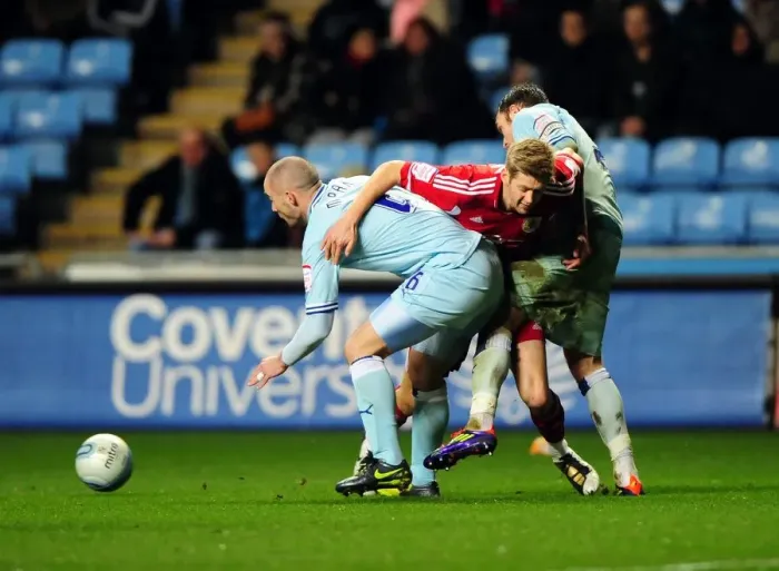Framed Print : Jon Stead's Tight Squeeze: Coventry City vs. Bristol City, Championship Clash (December 26, 2011)