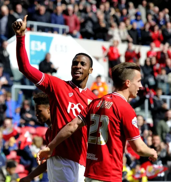 Framed Print : Jonathan Kodjia's Thrilling Goal Celebration: Bristol City vs. Huddersfield Town in Sky Bet Championship Framed Print : Jonathan Kodjia's Thrilling Goal Celebration: Bristol City vs. Huddersfield Town in Sky Bet Championship
