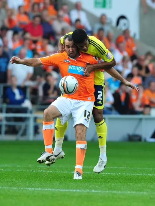 Framed Print : Jordan Spence vs Gary Taylor-Fletcher: Intense Battle in Blackpool v Bristol City League Cup Match, 01 / 10 / 2011