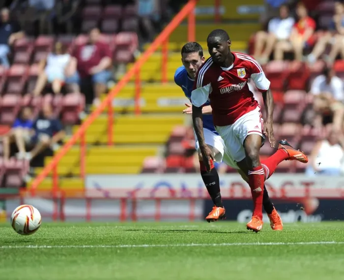Framed Print : Jordan Wynter Charges Forward: Bristol City vs. Glasgow Rangers Pre-Season Showdown