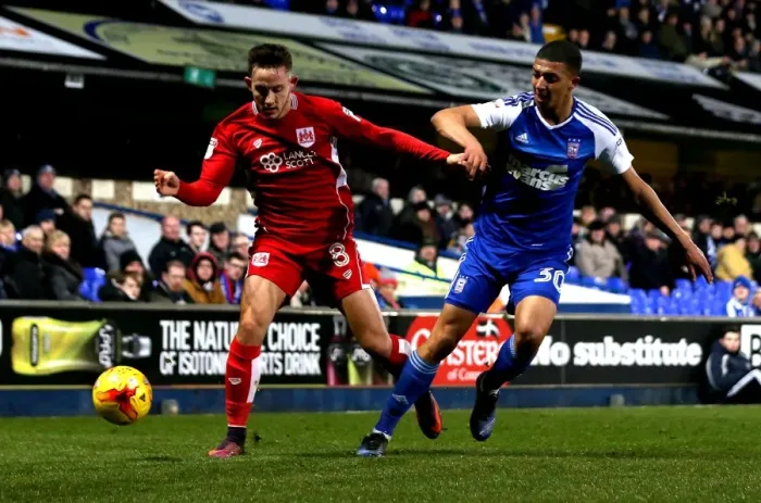 Framed Print : Josh Brownhill vs Myles Kenlock: Intense Tackle in Ipswich Town vs Bristol City Championship Clash