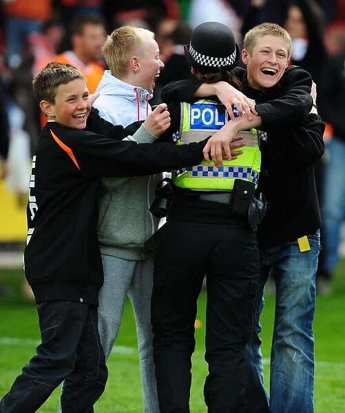 Jubilant Blackpool Fans Celebrate Championship Victory with Police: Blackpool v Bristol City (02 / 05 / 2010)