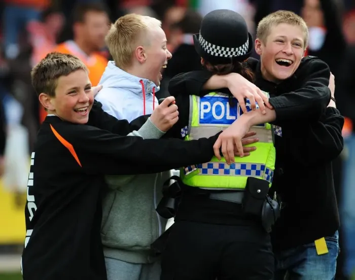Framed Print : Jubilant Blackpool Fans Celebrate with Police after Championship Victory over Bristol City (02 / 05 / 2010)