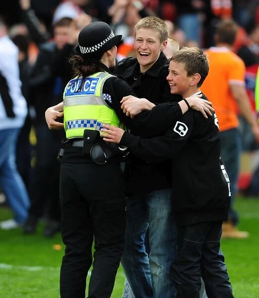 Jubilant Blackpool Fans and Police: Unforgettable Championship Victory Celebration - Blackpool v Bristol City (2010)