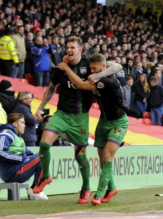 Framed Print : Jubilant Moment: Aden Flint and Nathan Baker's Euphoric Celebration after Bristol City's Victory at Nottingham Forest (2016)