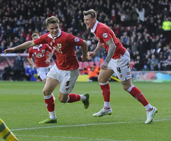 Jubilant Moment: Matt Smith and Aden Flint Celebrate Bristol City's League One Victory over Notts County