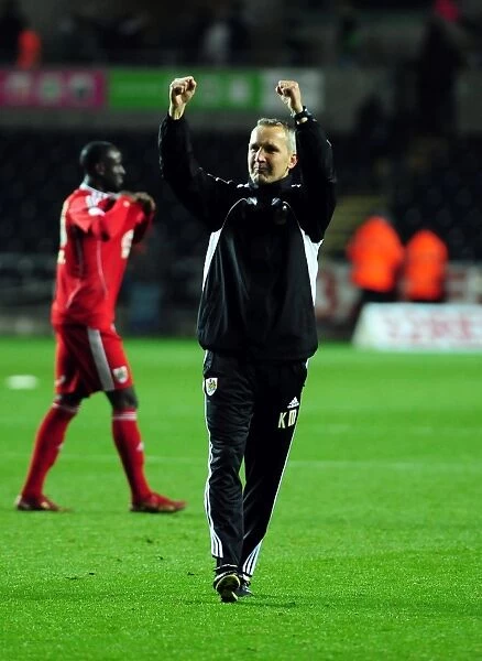 Keith Milen's Championship Victory: Bristol City Manager Celebrates at Swansea City's Liberty Stadium (10 / 11 / 2010)