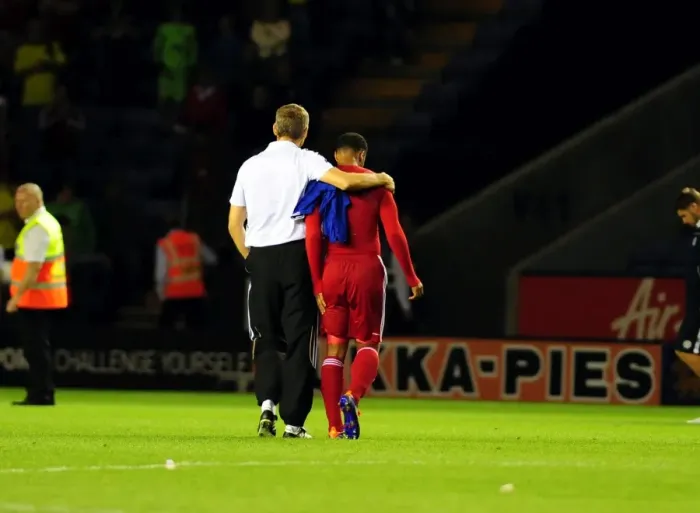 Framed Print : Keith Millen Holds On to In-Form Nicky Maynard Amid Transfer Speculation After His Brace Secures 2-1 Win for Bristol City over Leicester City